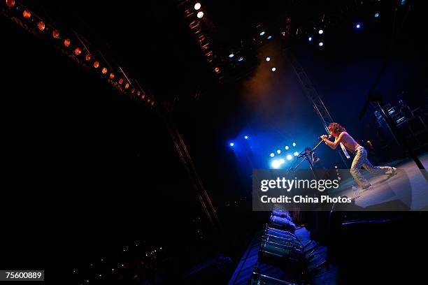 Dai Qin of the "Thin Man" band from China performs at the first "Green Flag - Erdos Grassland Rock Music Festival" near the Mausoleum of Genghis Khan...