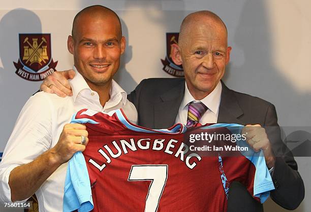 Chairman/CEO Eggert Magnusson poses with Frederik Ljungberg during a West Ham United press conference to announce Ljungberg's signing, at Upton Park...