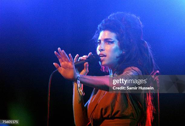 Amy Winehouse performs live at the International Festival of Benicassim on July 22, 2007 in Benicassim, Spain. The festival attracts people from all...