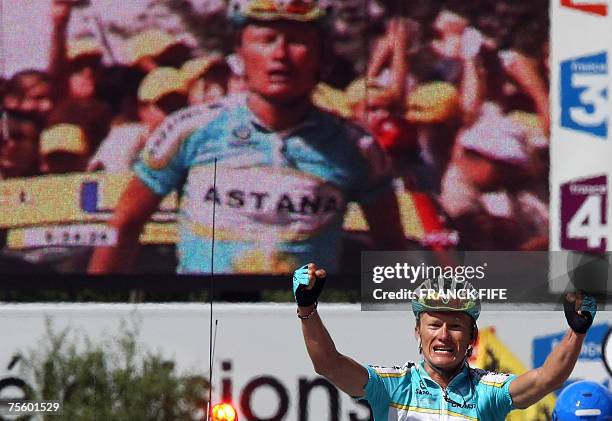 Kazakhstan?s Alexandre Vinokourov celebrates as he crosses the finish line of the 15th stage of the 94th Tour de France cycling race between Foix and...