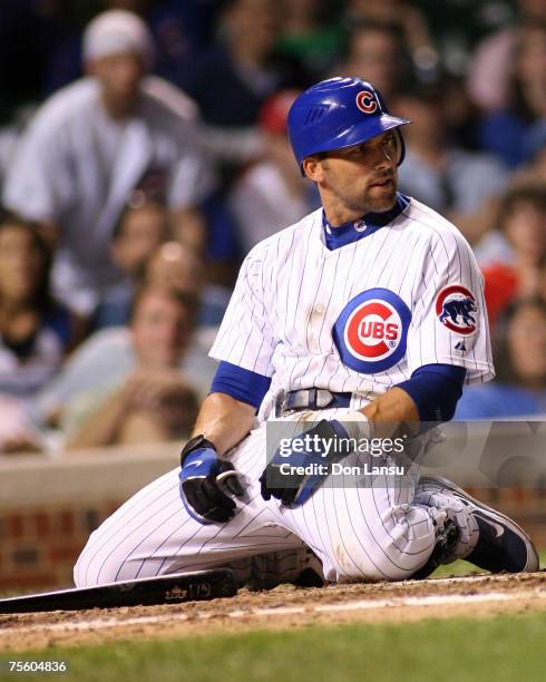 Chicago Cubs catcher Michael Barrett gives a look of disbelier after being hit with a pitch in the 9th inning-with the Cubs losing 9-0 ,during action...