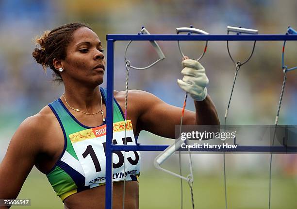 Katiuscia Jesus of Brazil hangs up her hammer after competing in the Women's Hammer Throw final during the 2007 XV Pan American Games at the Joao...