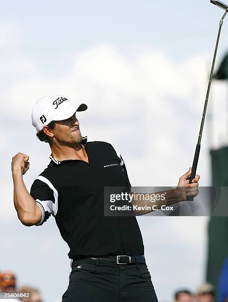 Adam Scott celebrates a par putt on the 18th green that gave him a two-shot victory in the final round of the 2007 Shell Houston Open Sunday, April 1...