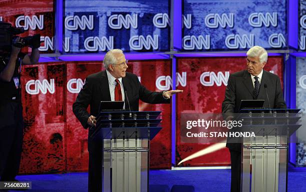 Charleston, UNITED STATES: Connecticut Senator Christopher Dodd listens as former Alaska senator Mike Gravel makes a point during the CNN/YouTube...