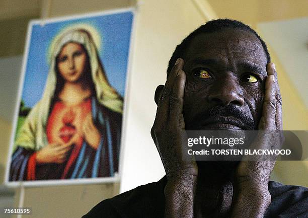 Goroka, PAPUA NEW GUINEA: TO GO WITH Health-lifestyle-PNG-AIDS-witchcraft,FEATURE This file photo dated 18 August, 2004 shows the Virgin Mary looking...