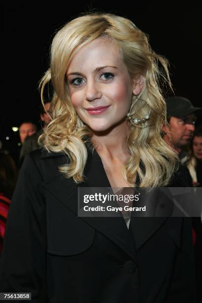 Actress Rachel Carpani arrives on the yellow carpet at "The Simpsons Movie" Australian premiere at Hoyts Entertainment Quarter, Moore Park on July...