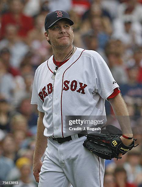 Red Sox's Curt Schilling gives up a home run to Melky Cabrera during a game between the Boston Red Sox and the New York Yankees at Fenway Park,...