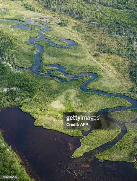 An arial view of one of the thousand rivers and lakes surrounding the Areva Resources Canada's McClean Lake site in northern Saskatchewan 17 July,...