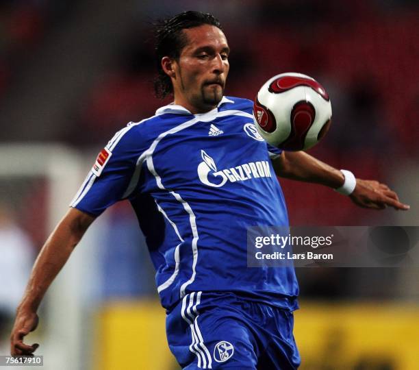 Kevin Kuranyi of Schalke stopps the ball during the Premiere Liga Cup Semi-final match between 1. FC Nuremberg and Schalke 04 at the EasyCredit...