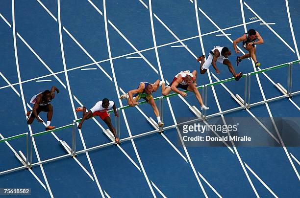 Carlos Chinin of Brazil competes in the second heat of the 110 meter hurdles of the Men's Decathlon during the 2007 XV Pan American Games at the Joao...