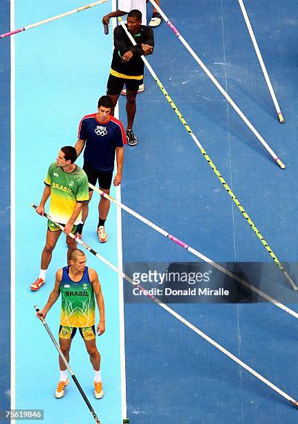 Ivan Silva and Carlos Chinin of Brazil prepare to compete in the Pole Vault event of the Men's Decathlon during the 2007 XV Pan American Games at the...