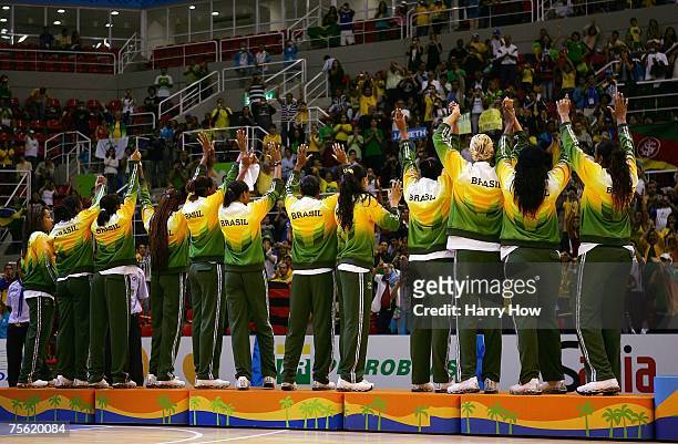 Team Brazil salute the crowd after receiving their silver medals during the Women's Basketball final between Brazil and the United States of America...