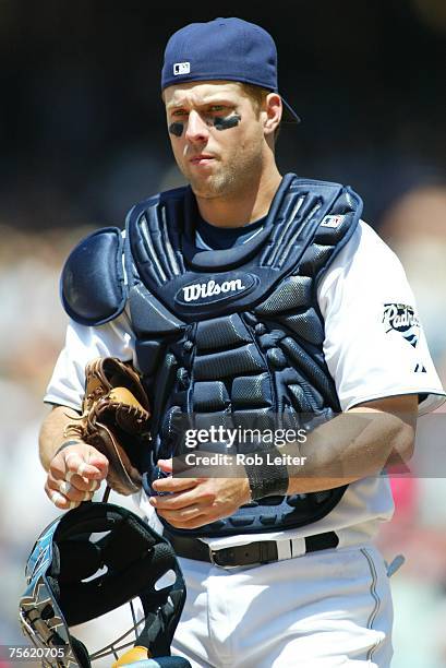 Michael Barrett of the San Diego Padres catches during the game against the Boston Red Sox at Petco Park in San Diego, California on June 24, 2007....