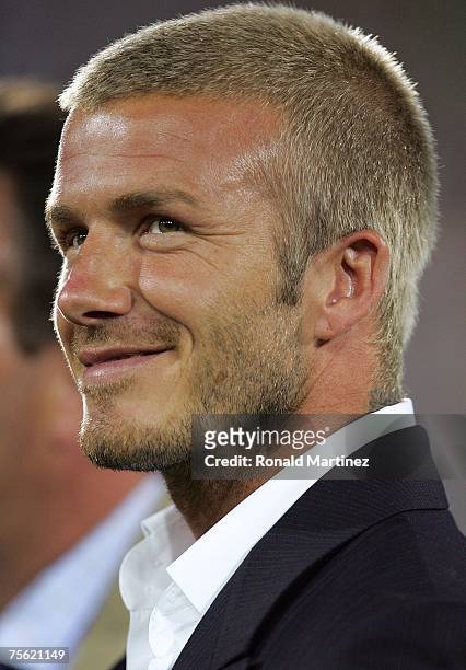 David Beckham of the Los Angeles Galaxy looks on prior to presenting U-17 MLS Youth Cup trophy to D.C. United at the half of the 2007 Sierra Mist MLS...
