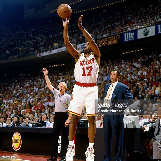 Mario Elie of the Houston Rockets attempts a shot against the Orlando Magic in Game Four of the 1995 NBA Finals played June 14, 1995 at the Summit in...