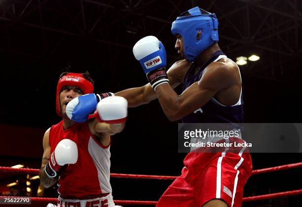 Demetrius Andrade of the USA lands a punch on Diego Chaves of Mexico in the boxing semifinals during the XV Pan American Games at Riocentro on July...