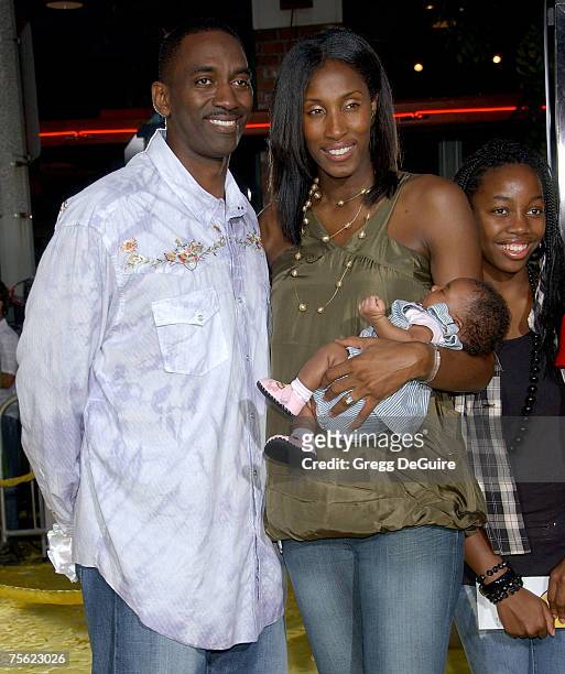 Basketball player Lisa Leslie, husband Michael Lockwood and daughter Lauren arrive at "The Simpsons Movie" premiere at the Mann Village Theatre on...