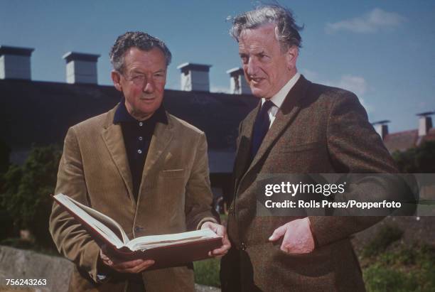 English composer and conductor Benjamin Britten pictured on left with English singer Peter Pears in England circa 1965.