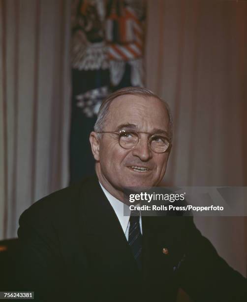 American politician and 33rd President of the United States, Harry S Truman pictured in an office circa 1947.