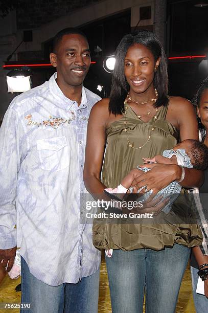 Basketball player Lisa Leslie, husband Michael Lockwood and daughter Lauren arrives at "The Simpsons Movie" premiere at the Mann Village Theatre on...