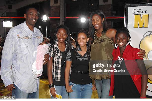 Basketball player Lisa Leslie, husband Michael Lockwood and daughter Lauren arrives at "The Simpsons Movie" premiere at the Mann Village Theatre on...