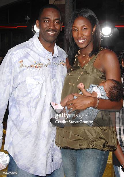 Basketball player Lisa Leslie, husband Michael Lockwood and daughter Lauren arrives at "The Simpsons Movie" premiere at the Mann Village Theatre on...