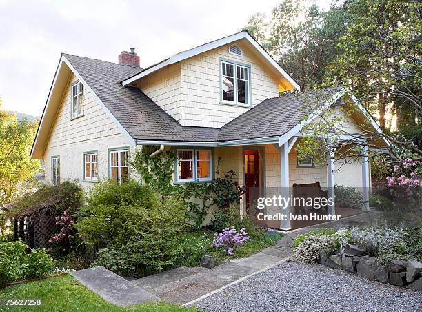 exterior of cottage style house with front yard - front lawn stock pictures, royalty-free photos & images