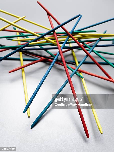 multicoloured pick-up sticks - mikado stock pictures, royalty-free photos & images