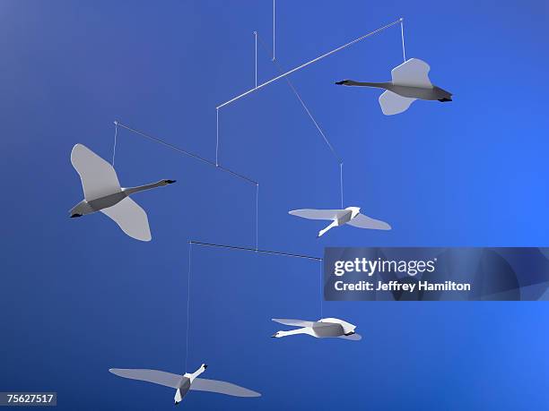 hanging mobile with origami geese - baby mobile stock pictures, royalty-free photos & images