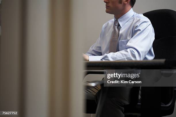 man sitting in office chair, mid section - shirt and tie stock pictures, royalty-free photos & images