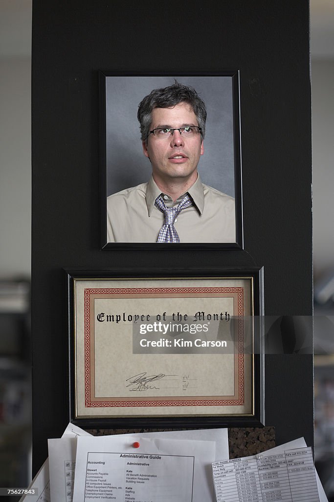 Employee of the month certificate with photo of man