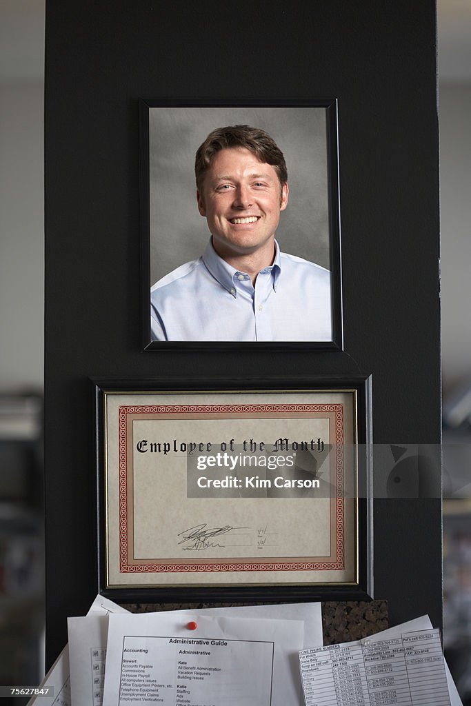 Employee of the month certificate with photo of man