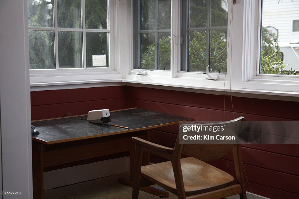 Desk and chair by window