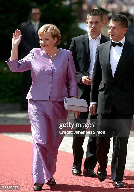 German Chancellor Angela Merkel and her husband Joachim Sauer arrive for the premiere of the Richard Wagner festival on July 25, 2007 in Bayreuth,...