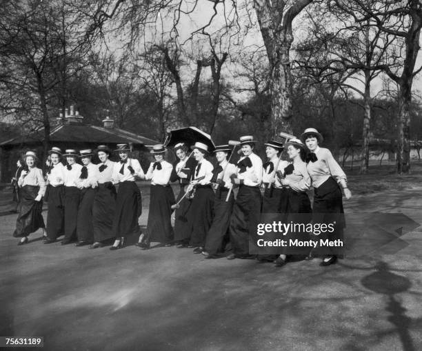 Students from Westfield College, Hampstead, in period dress, walking in Hyde Park, London, before taking part in a pageant organized by London...