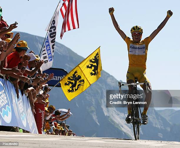 Race leader Michael Rasmussen of Denmark and Rabobank celebrates winning stage 16 of the 2007 Tour de France from Orthez to Gourette Aubisque on July...