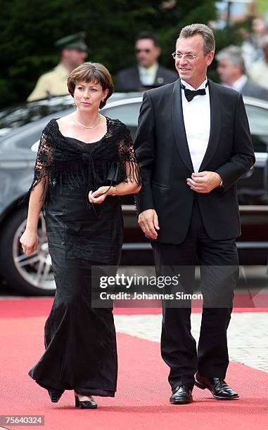 Bavaria's education secretary Siegfried Schneider and his wife arrive for the premiere of the Richard Wagner festival on July 25, 2007 in Bayreuth,...