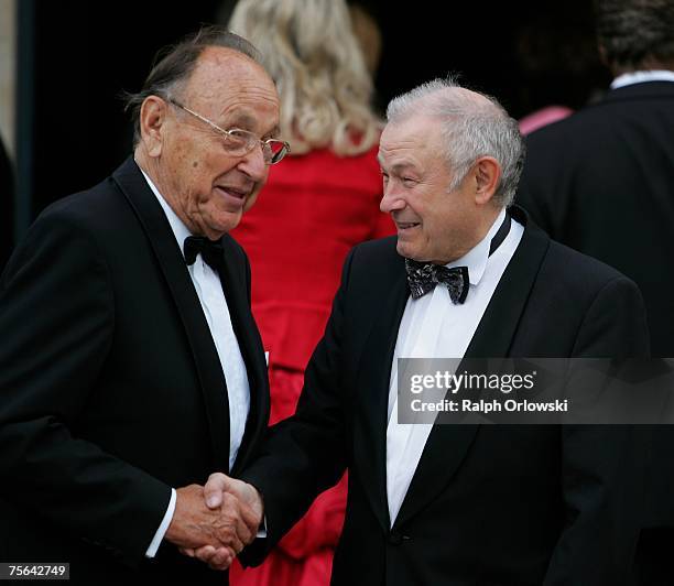 Former German Foreign Minister Hans-Dietrich Genscher and Bavarian Interior Minister Guenther Beckstein arrive for the premiere of the Richard Wagner...