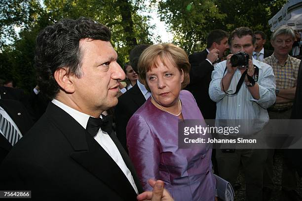 Jose Manuel Barroso , president of the European commission and German Chancellor Angela Merkel chat together during the first pause of the premiere...