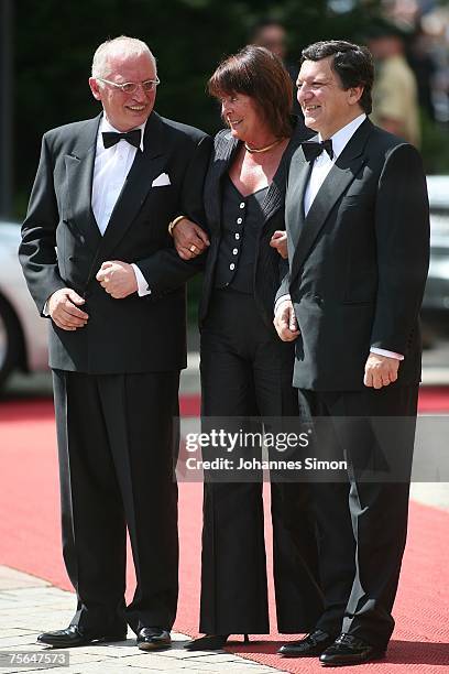 President of the European Commission Jose Manuel Barroso and his deputy Guenter Verheugen accompanied by his wife Gabriele arrive for the premiere of...