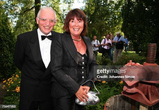 Guenter Verheugen and his wife Gabriele poseduring the first pause of the premiere of the Richard Wagner festival on July 25, 2007 in Bayreuth,...