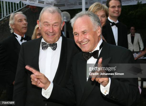 Guenther Beckstein and Erwin Huber chat together during the first pause of the premiere of the Richard Wagner festival on July 25, 2007 in Bayreuth,...