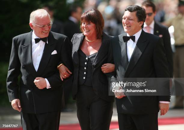 President of the European Commission Jose Manuel Barroso and his deputy Guenter Verheugen accompanied by his wife Gabriele arrive for the premiere of...
