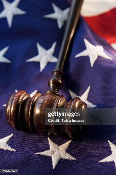 judge's gavel on american flag - vertical flag stock pictures, royalty-free photos & images