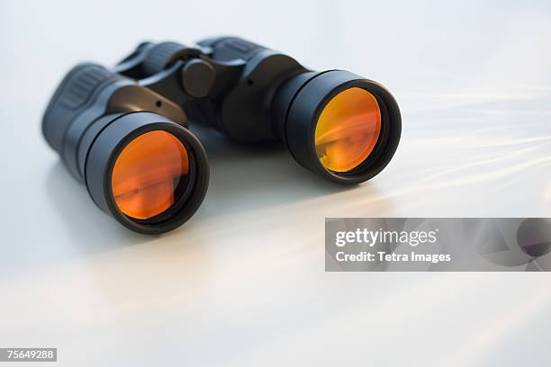 binoculars on table - viewing binoculars stock pictures, royalty-free photos & images