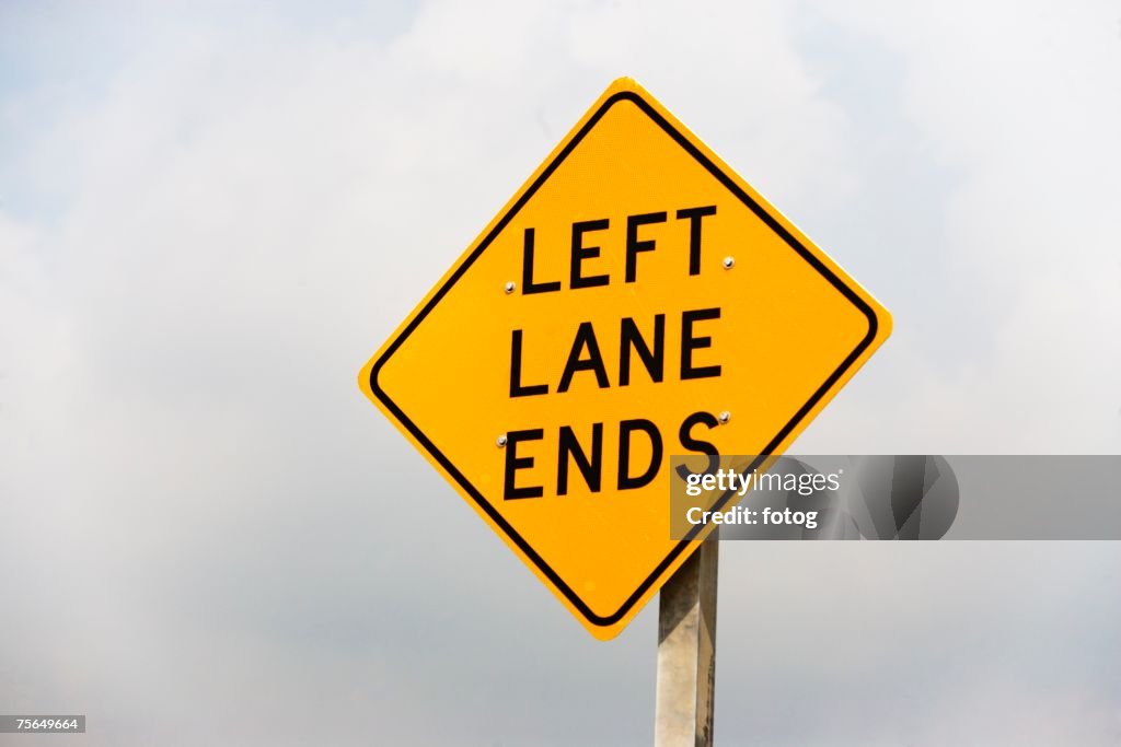 Left Lane Ends street sign
