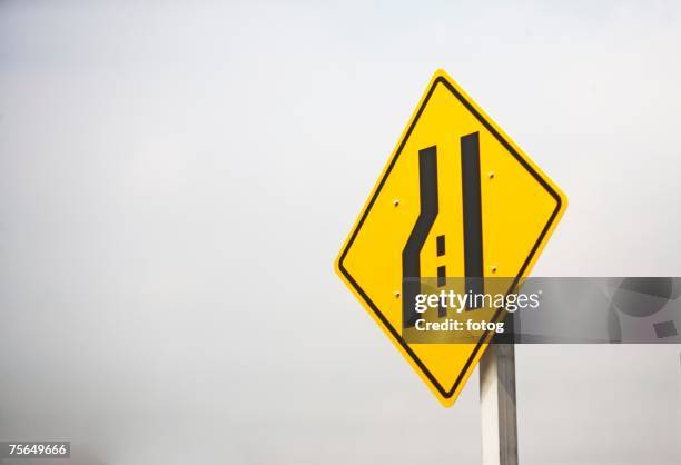 Converging Rode Sign Converging Lanes Photos and Premium High Res Pictures - Getty Images