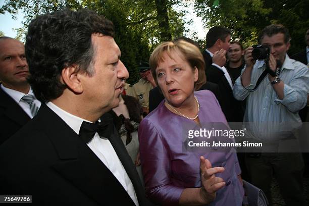 Jose Manuel Barroso , president of the European commission and German Chancellor Angela Merkel chat together during the first pause of the premiere...