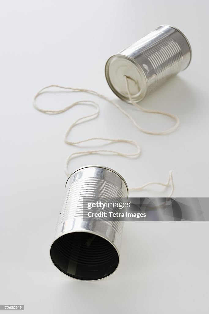 Tin cans connected by string