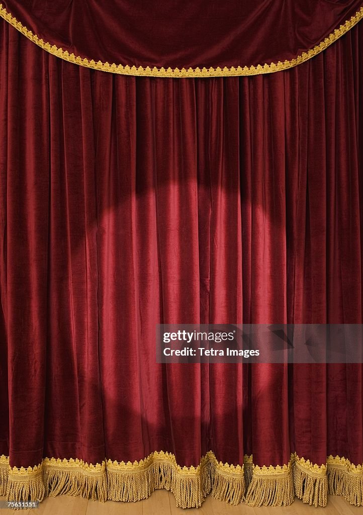 Spotlight on stage curtain